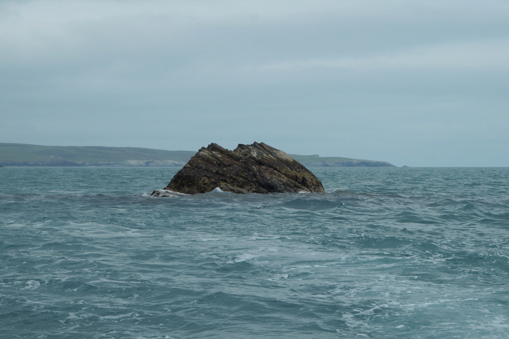image of a rock in the sea